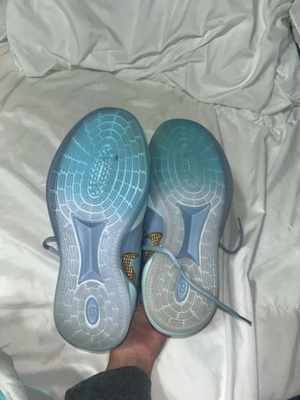 Nike Women's Light Blue Sneakers with Iridescent Gold Swoosh